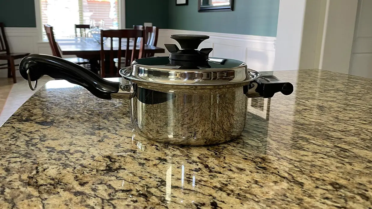 You can set a hot pot on a granite surface.